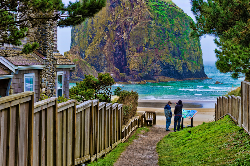 people by house on Cannon Beach