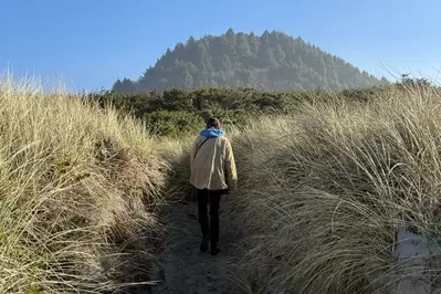 person hiking near Rockaway Beach