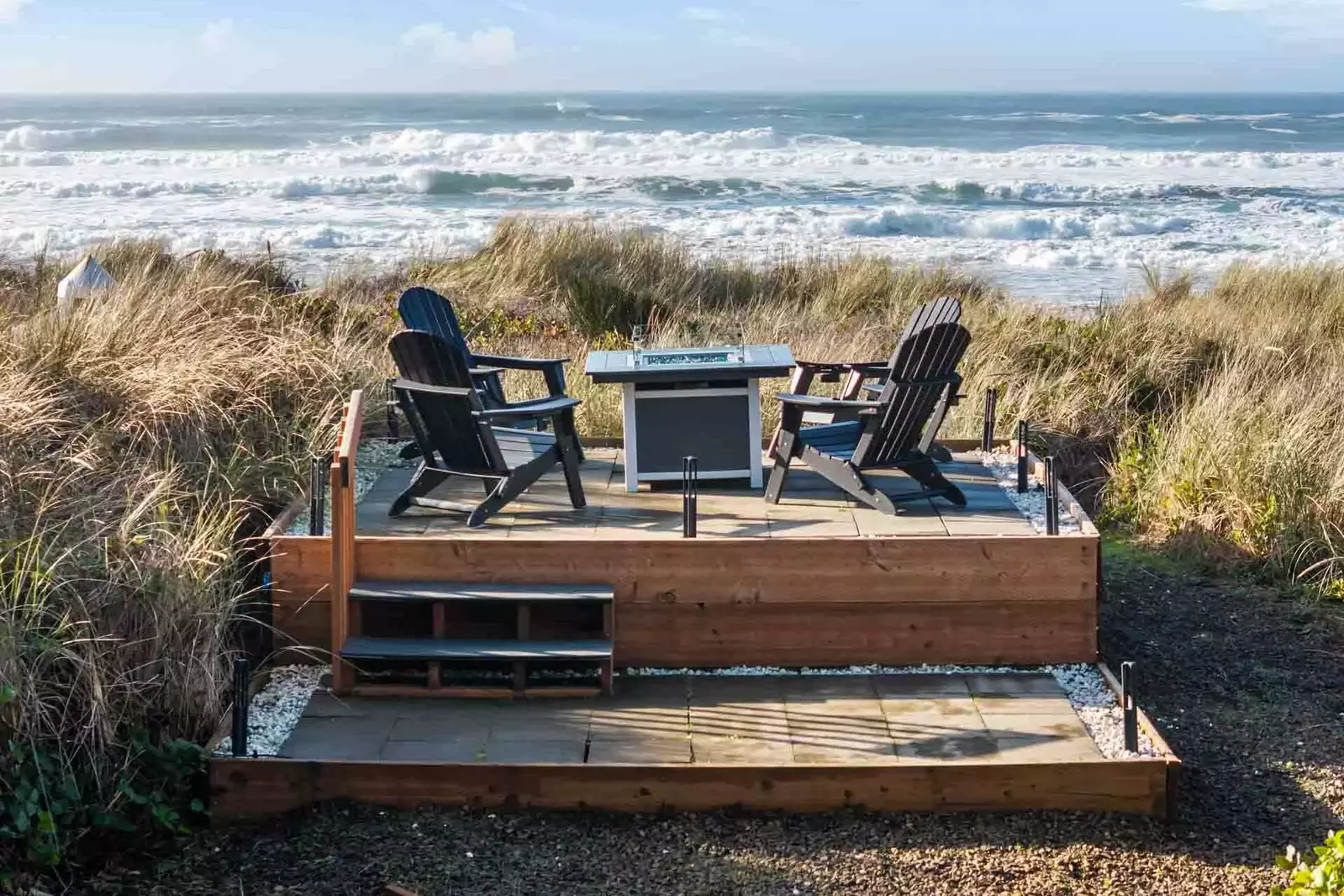 The fire table is wonderful spot to relax and watch the waves. Keep an eye out for whales!