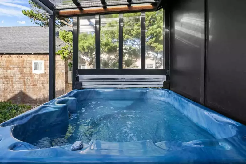 The hot tub is a favorite amenity perfect during warm summers and enchanting winters.