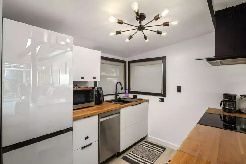 The kitchen is well equipped and efficient. Perfect place to prepare a delicious meal.