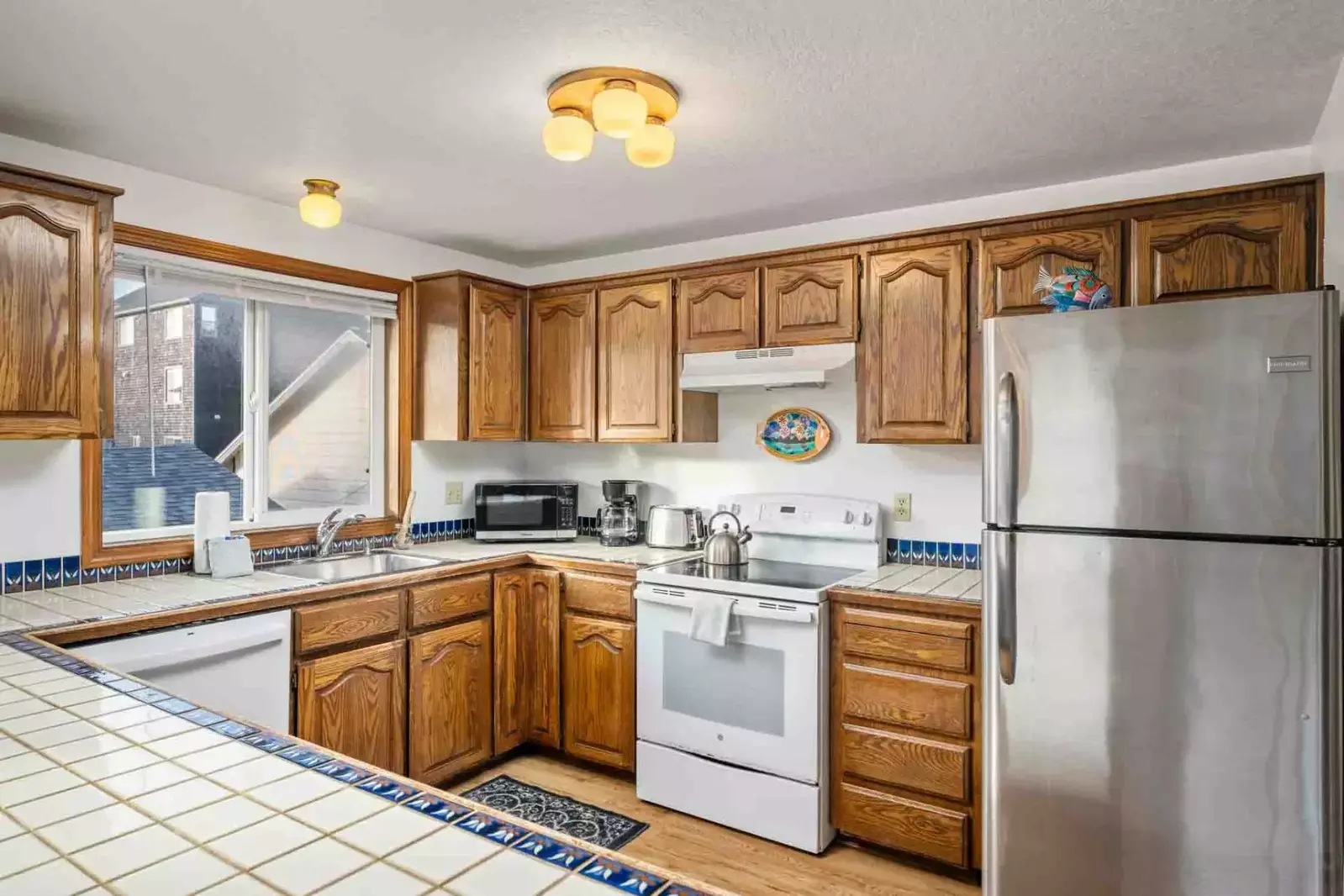 The kitchen is well equipped for a delicious culinary experience. Perfect for cooking dinner, baking cookies, and feeding the whole family!