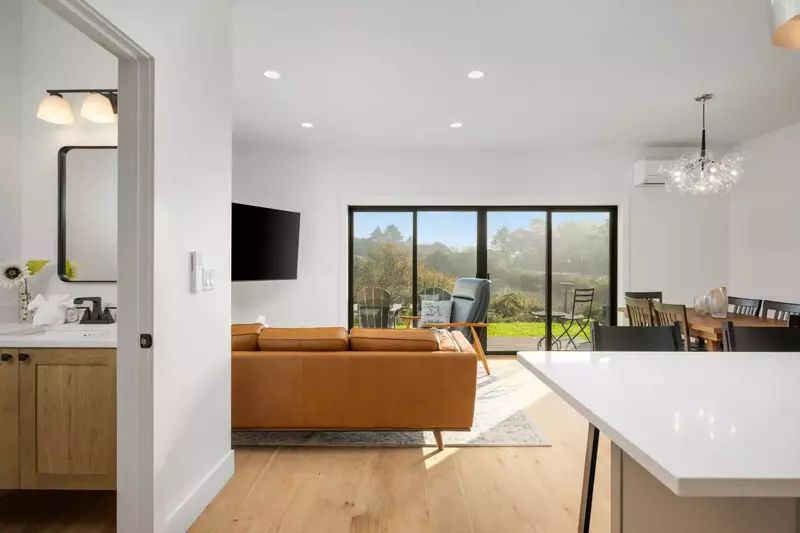 Enjoy a beautiful view of Lake Marie through the large windows.