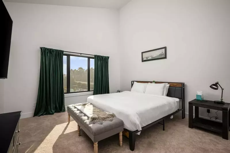 This room has exquisite design, a comfy king bed, a smart tv, and great views!