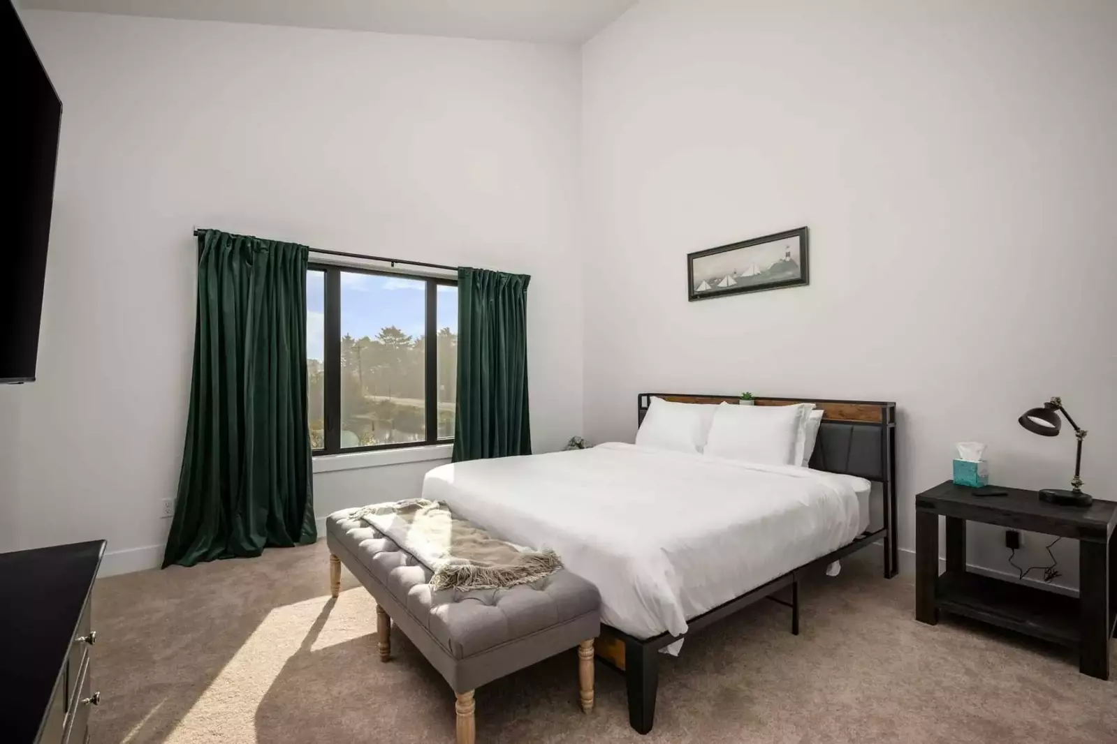 This room has exquisite design, a comfy king bed, a smart tv, and great views!
