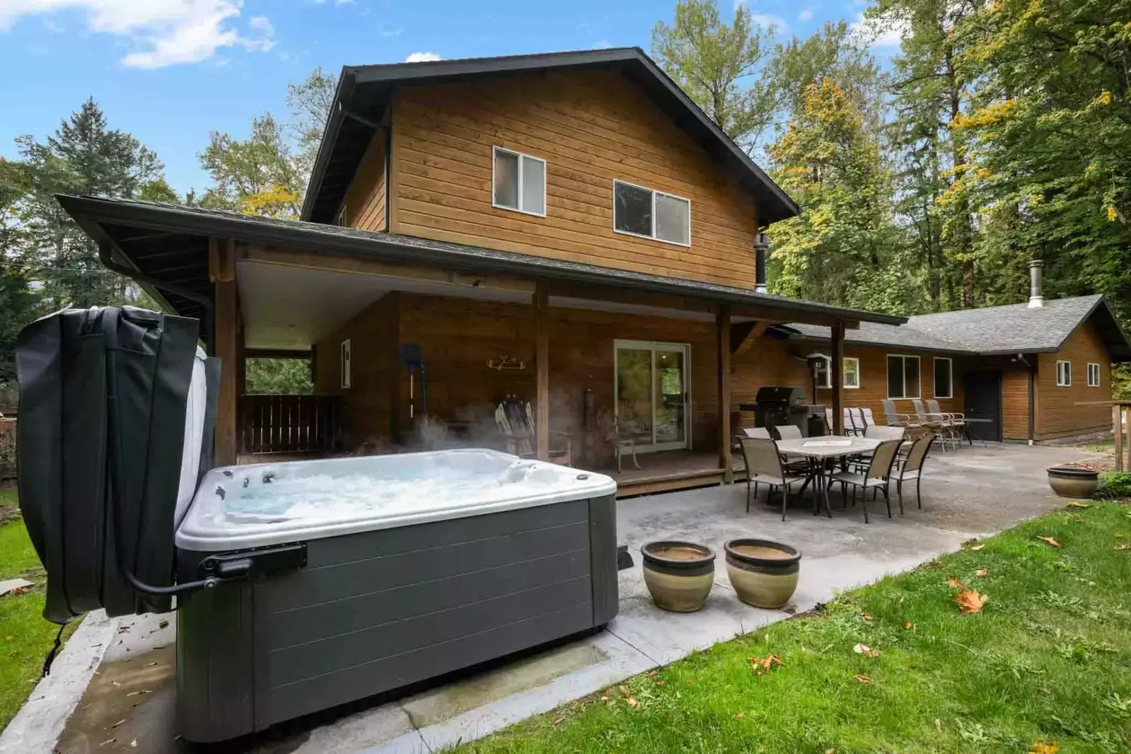 The hot tub is a favorite amenity perfect during warm summers and enchanting winters.