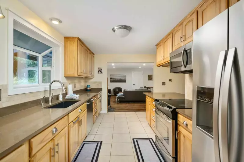 The kitchen has ample counter space and up to date appliances.