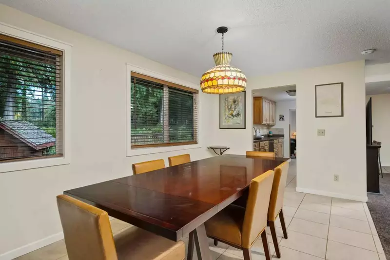 The elegant dining room table is a perfect place for a decadent dinner.