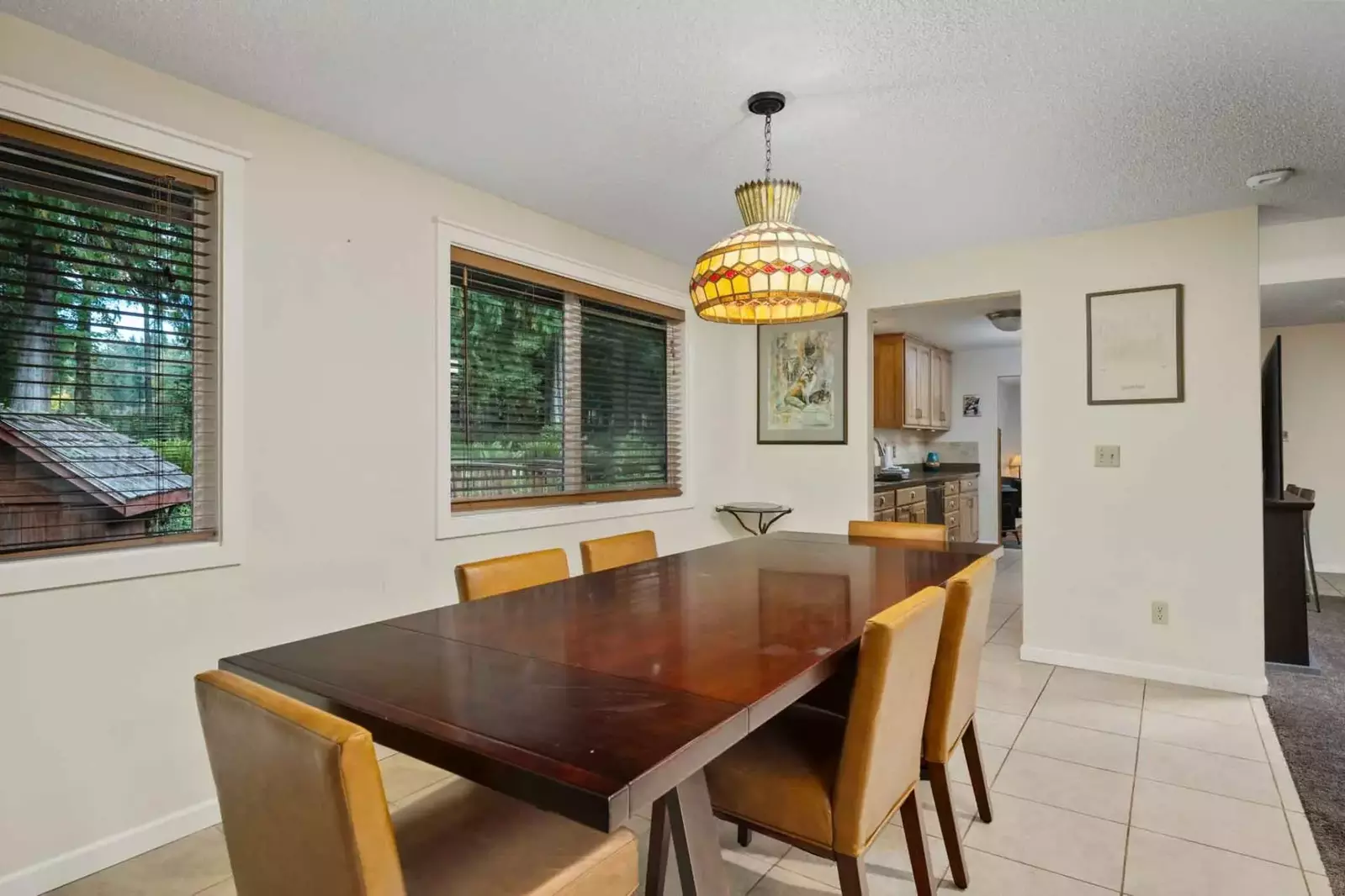 The elegant dining room table is a perfect place for a decadent dinner.