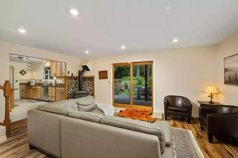 The living room is an open common area perfect for relaxing and recharging after a day of woodland adventures.