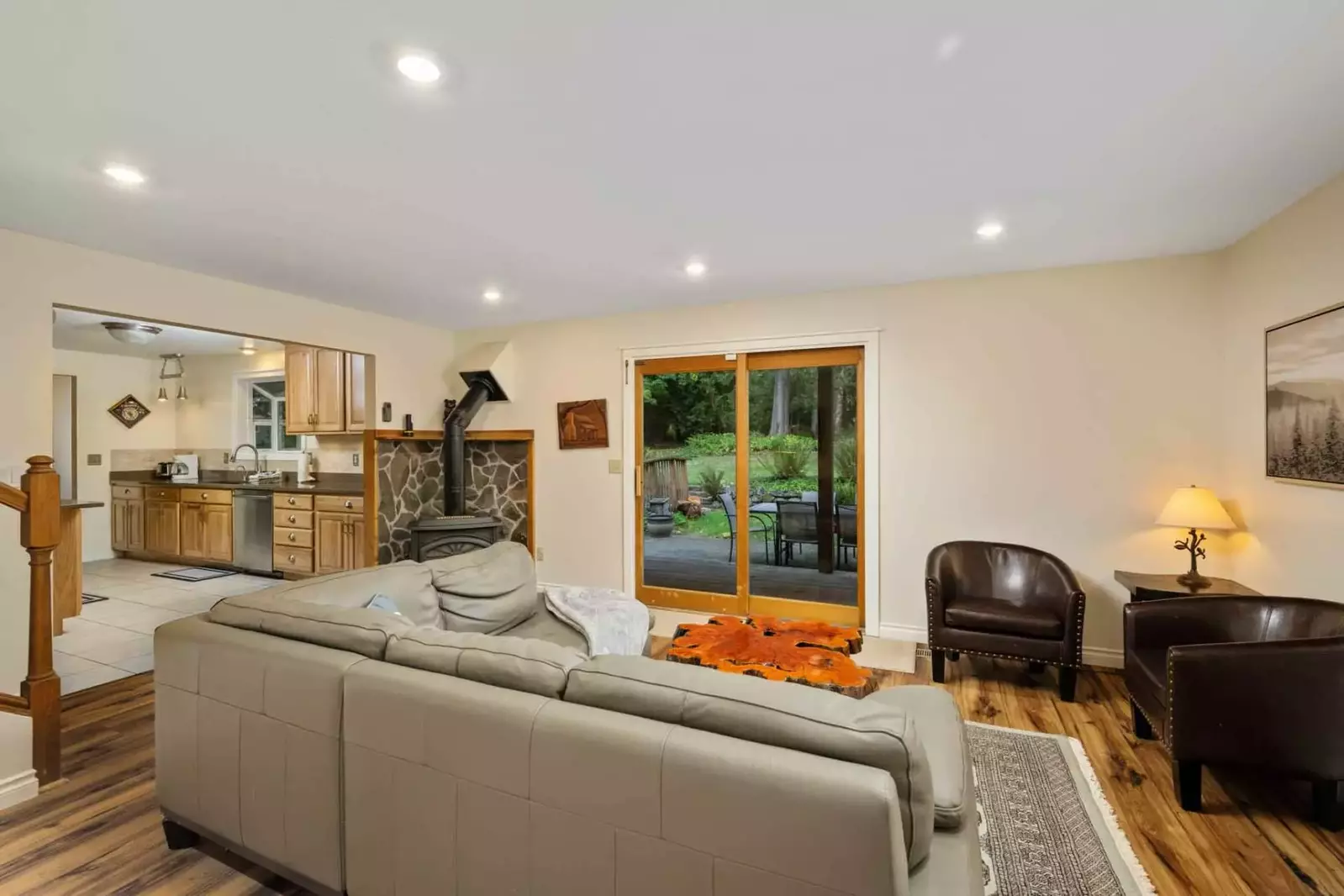 The living room is an open common area perfect for relaxing and recharging after a day of woodland adventures.