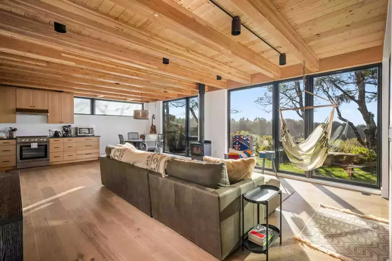 The massive windows and comfy seating allow guests to enjoy lovely views yearound.