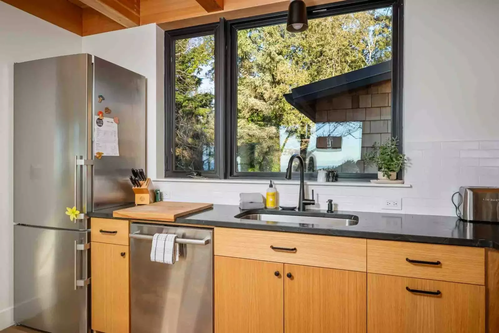 The kitchen is spacious and efficient with state of the art appliances. Perfect place to prepare a family meal.