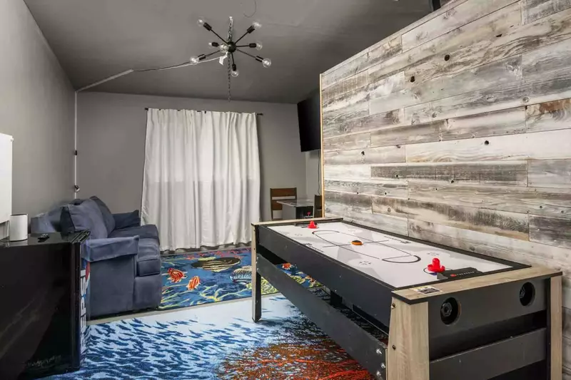 The game room is a fun place to hang out with friends and family. Enjoy the arcade, air hockey, a tv, and more.