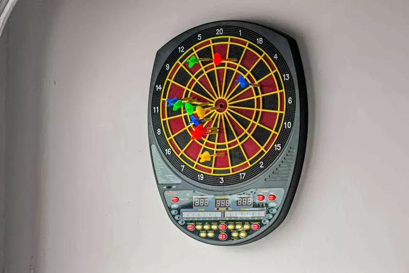 Play a game of darts in the game room.