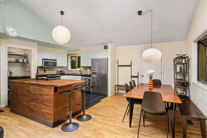 The kitchen and dining room off plenty of counter and table space.