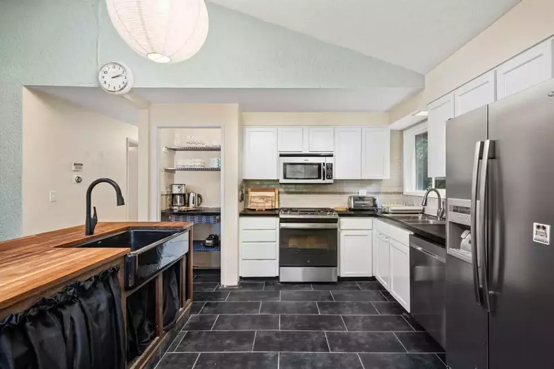 The kitchen is spacious and efficient. Perfect place to prepare a family meal.