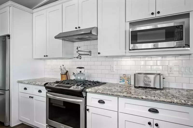 The kitchen is spacious and efficient with up to date appliances.