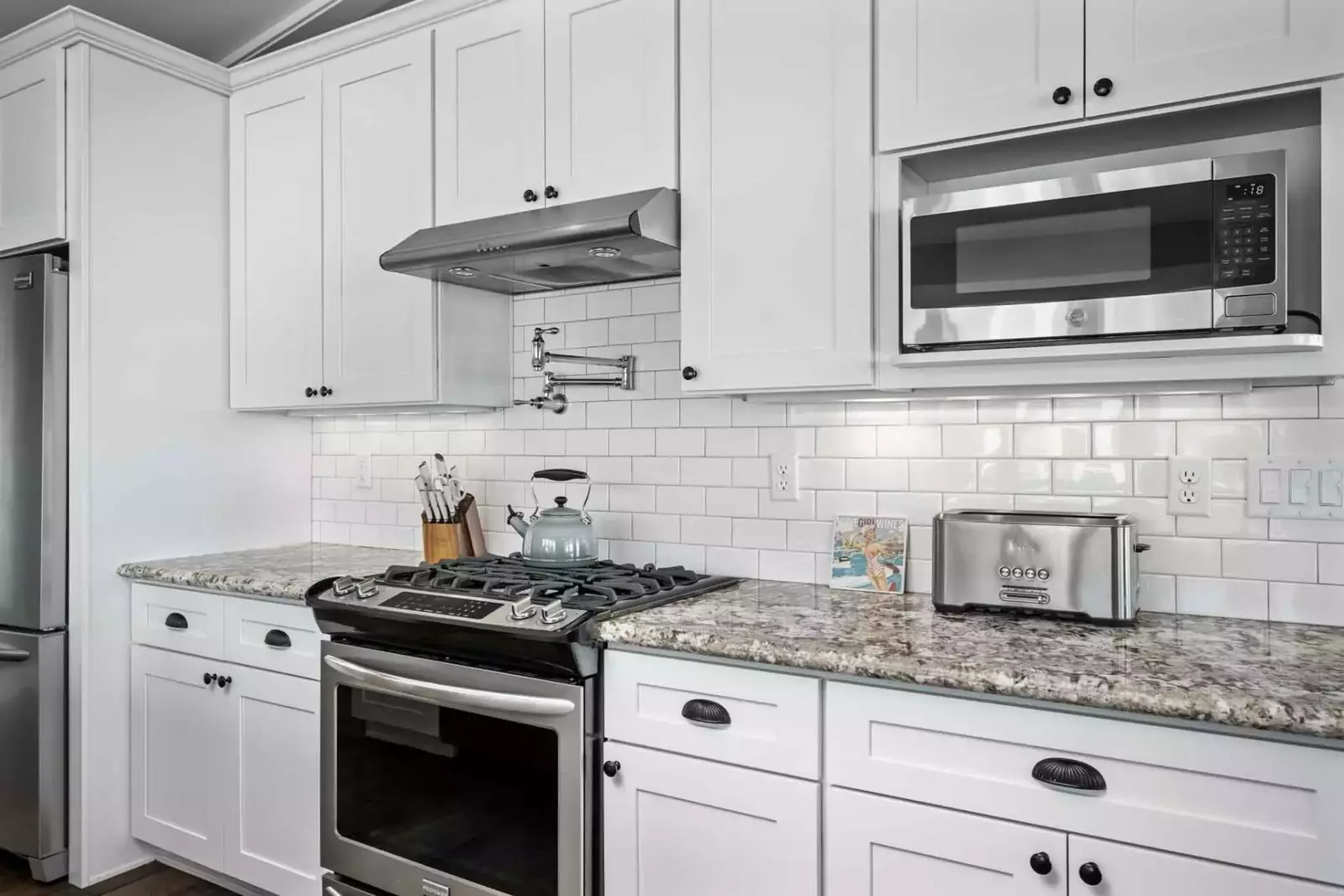 The kitchen is spacious and efficient with up to date appliances.