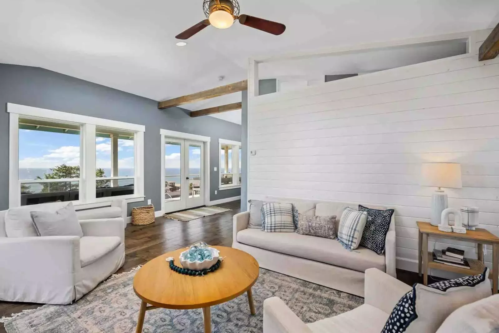 The living room is a comfy place to relax after a day on the beach.