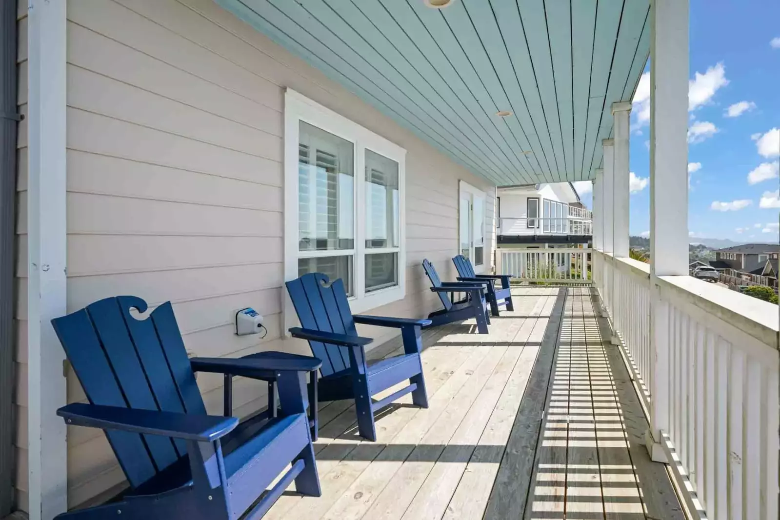 Enjoy the ocean air while relaxing on the deck.