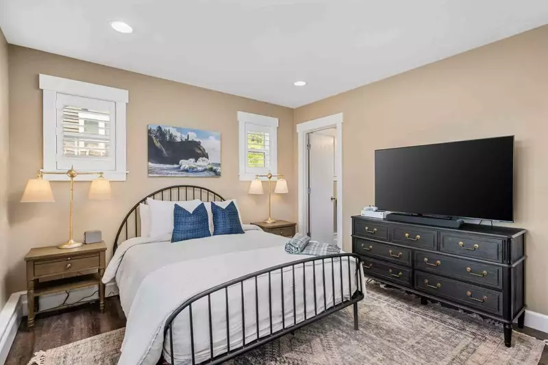 Each bedroom has a comfy bed and a large smart tv.