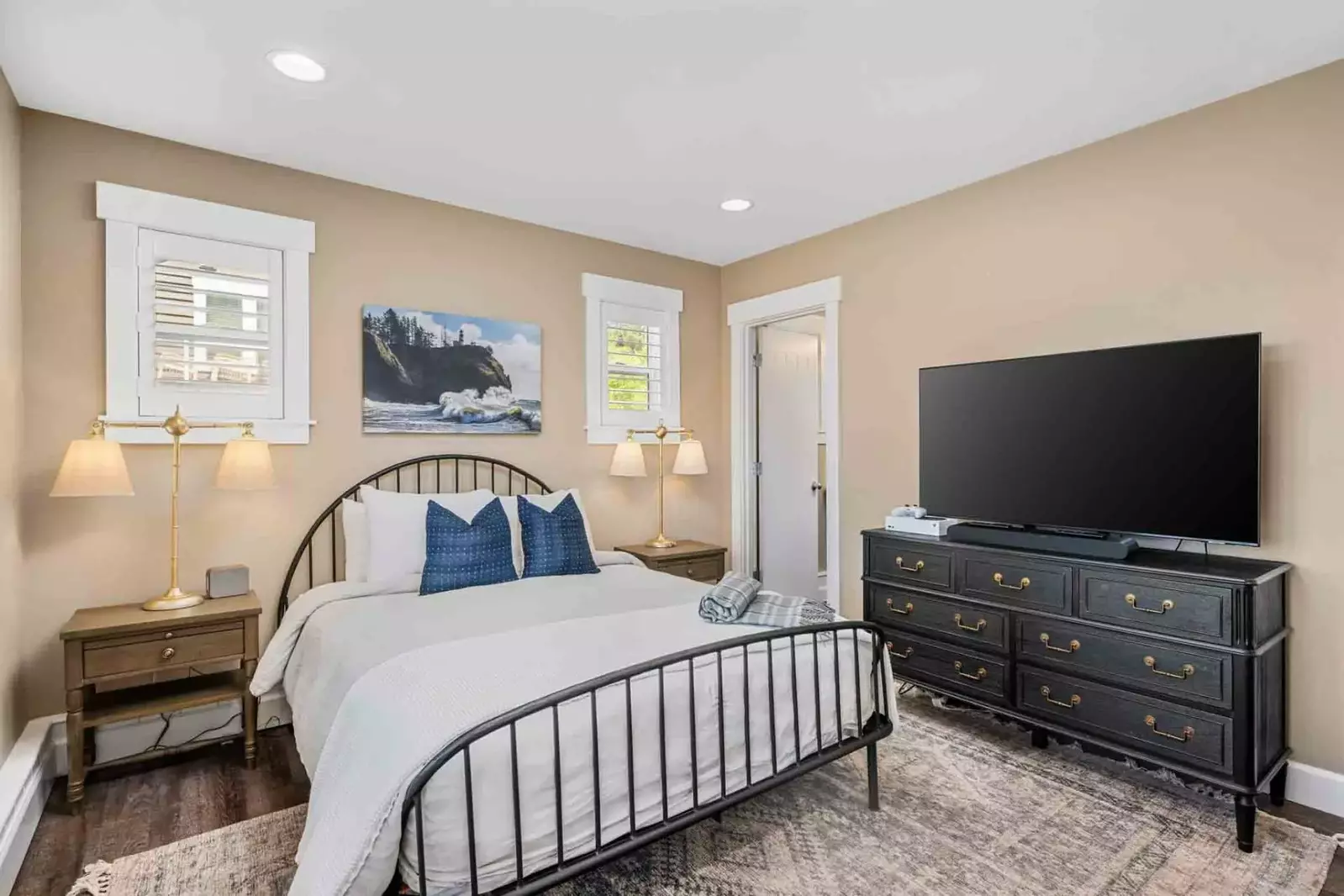 Each bedroom has a comfy bed and a large smart tv.