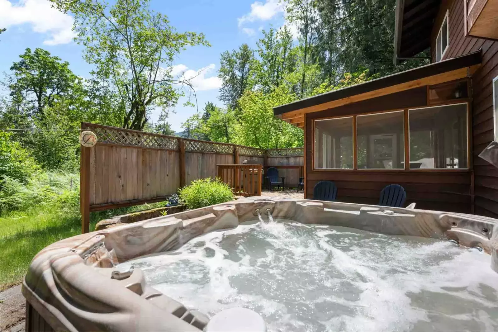 The hot tub is a favorite amenity perfect during warm summers and chilly winters.