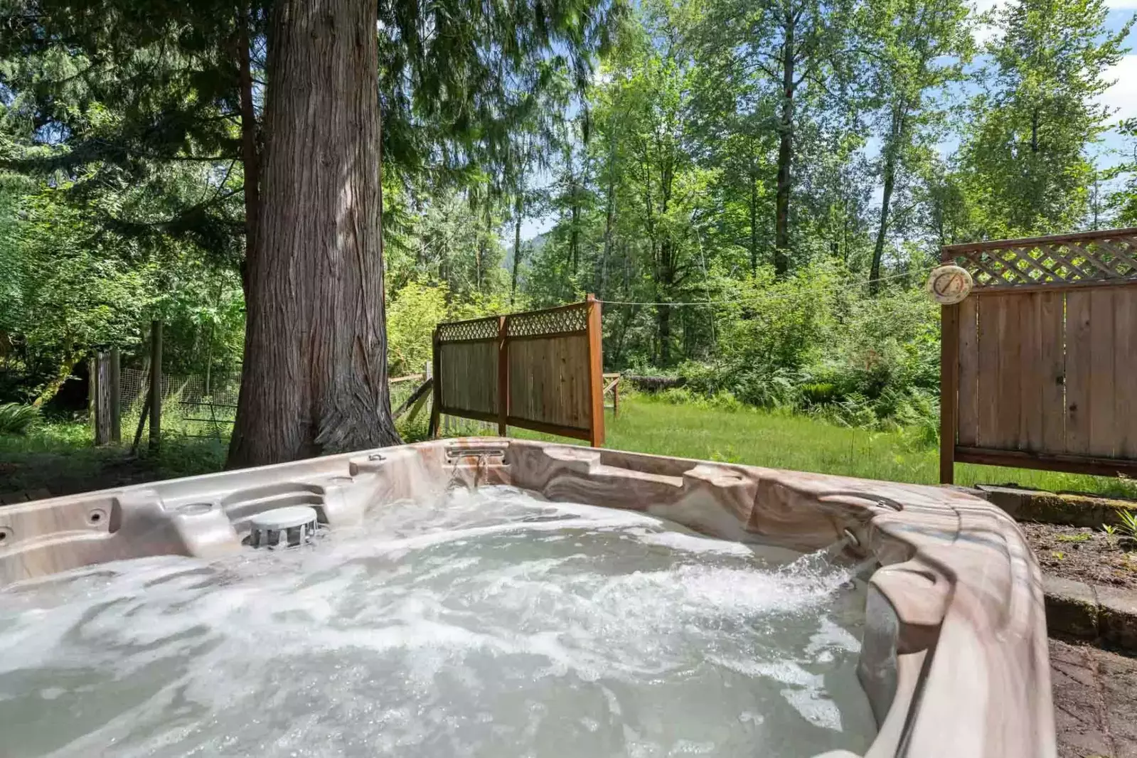 Enjoy a soak in the hot tub after a lovely day hiking or skiing.