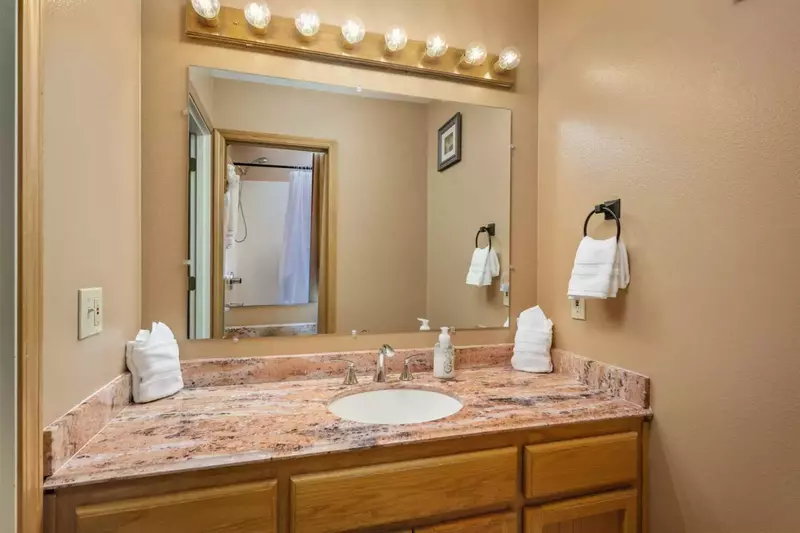 The bathroom is recently updated and decorated.