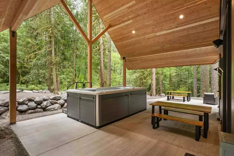 The hot tub is a favorite amenity perfect for getting warm after a day in the snow.