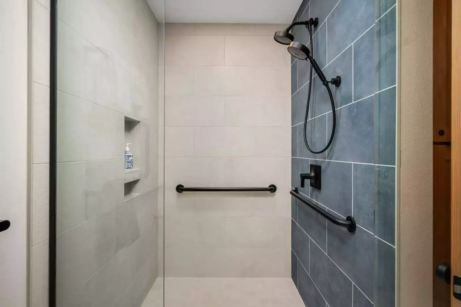 The shower is spacious, up to date, and has excellent water pressure.
