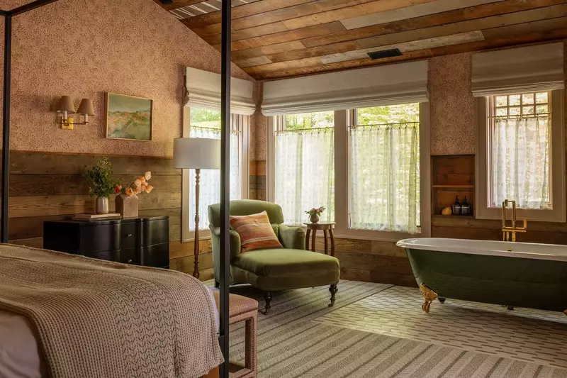 This room has an exceptionally cozy bed and a relaxing clawfoot bathtub.