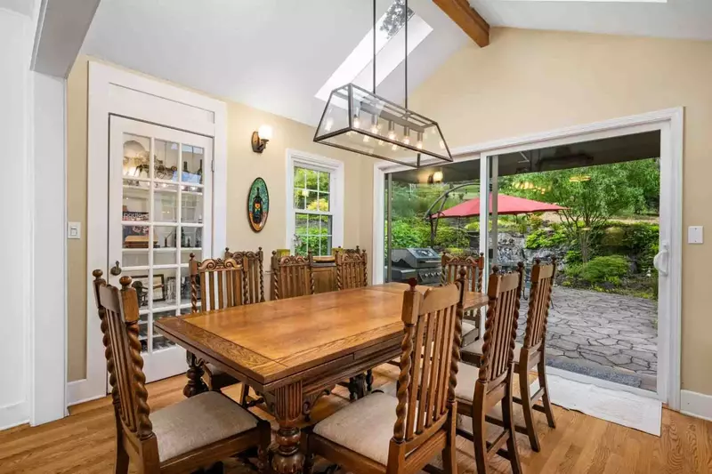 The lovely dining room table has a wonderful view.