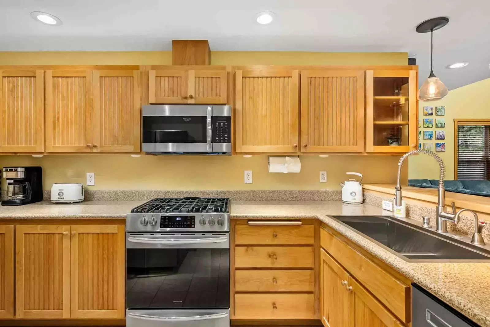 The kitchen has ample counter space and up to date appliances.