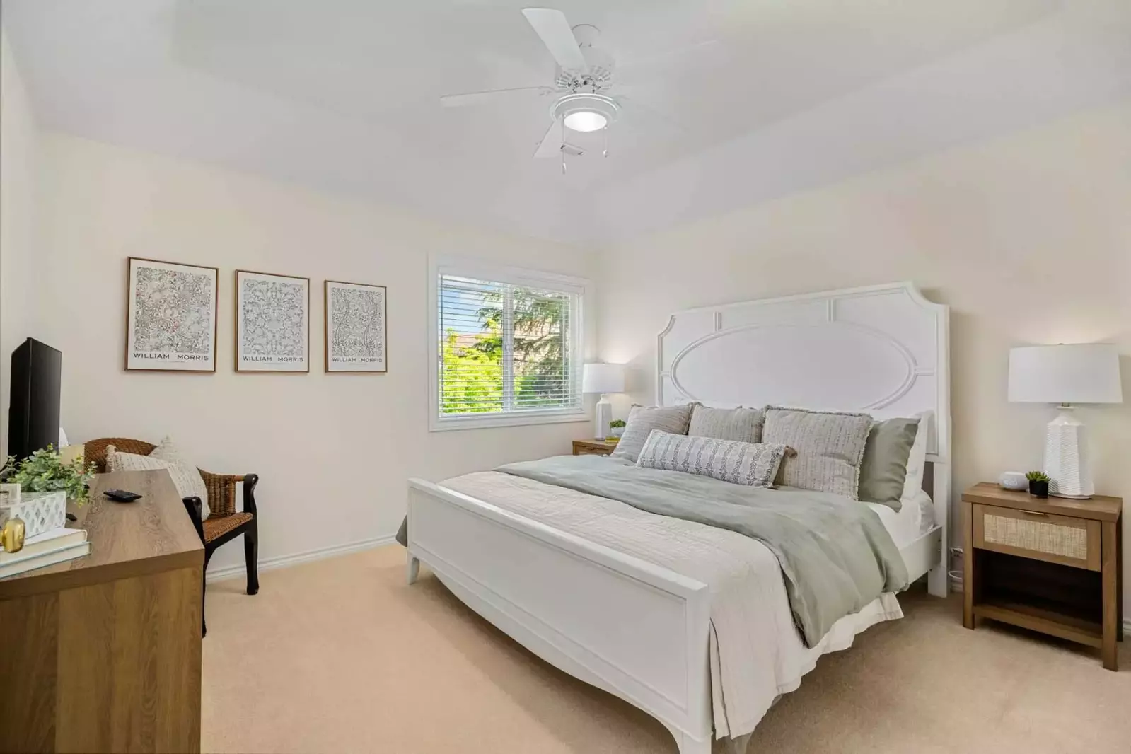 Another comfortable bed with a smart tv.