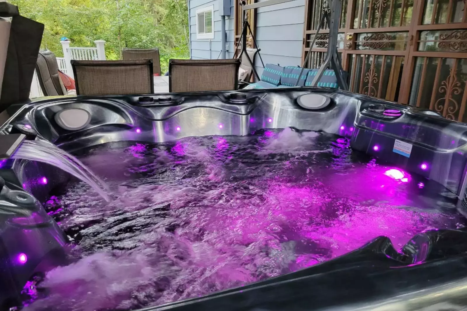 Glow mode: activated! Soak in the vibes as the hot tub lights dance through a spectrum of color and calm.