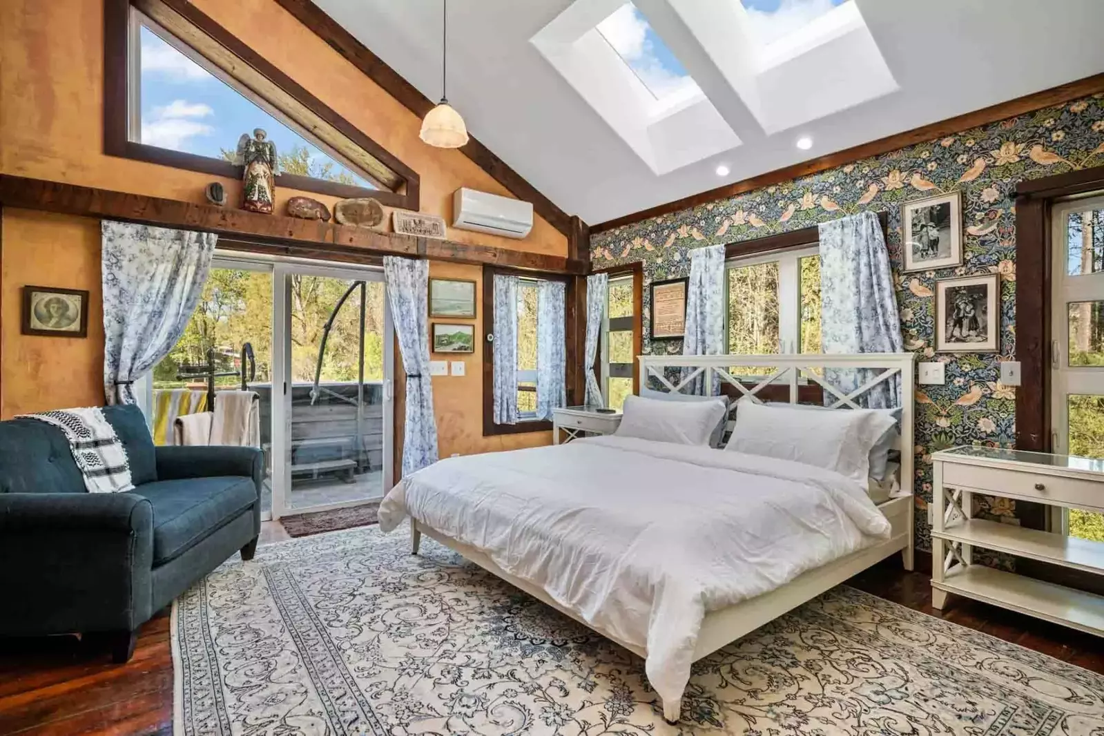 This bedroom is large with a comfy king bed, and access to the deck.