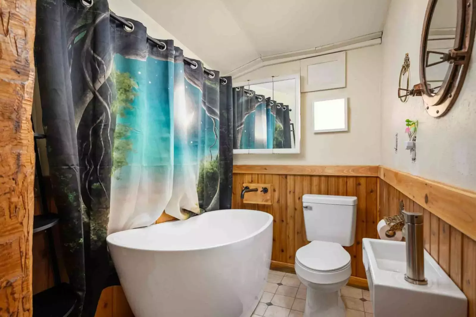 The bathroom is recently updated and decorated.