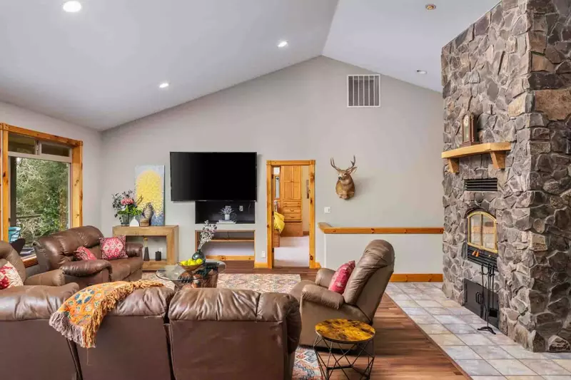 The living room is an open common area perfect for relaxing and recharging after a day of adventures.