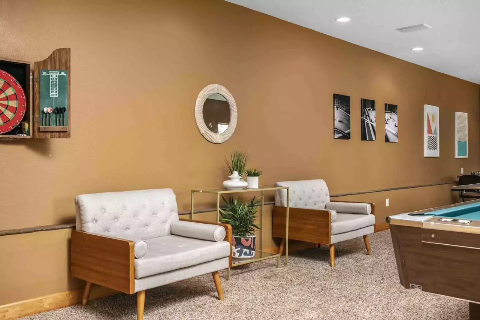 The game room has a lovely retro chic design.