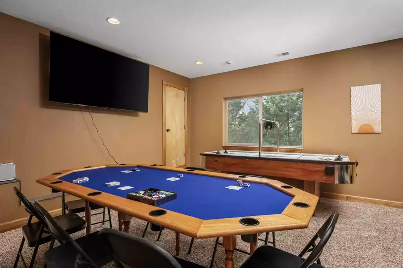 Play a game of cards on the poker table.