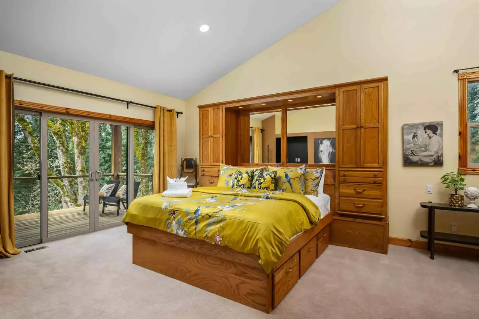 This bedroom is spacious with an incredibly comfortable bed.