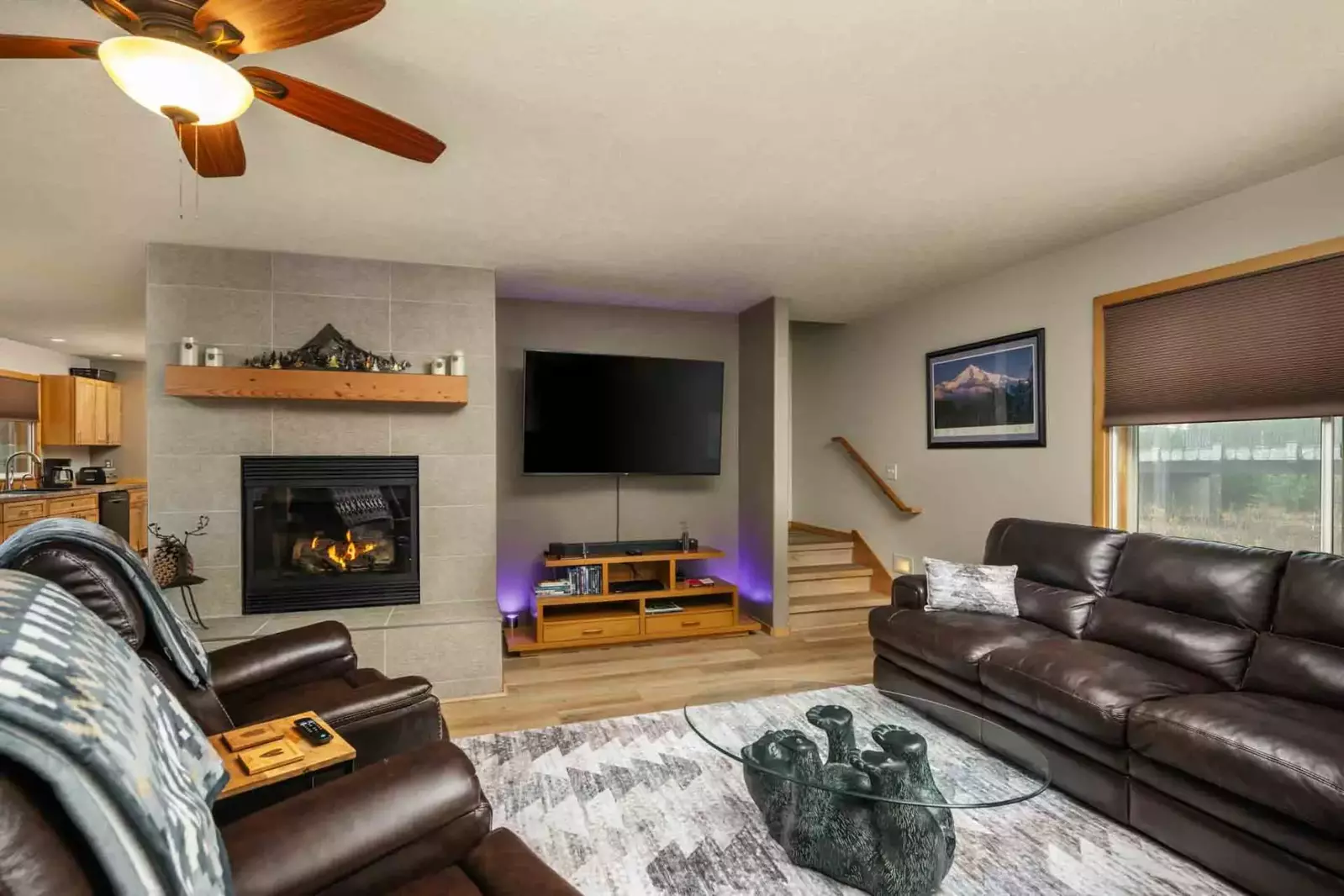 Watch you favorite movies, shows, and sports on this smart tv while relaxing in front of a cozy fire.