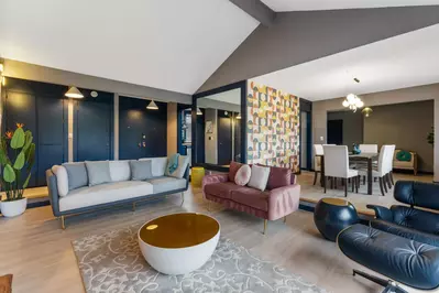 Gather and relax in this chicly decorated living room.