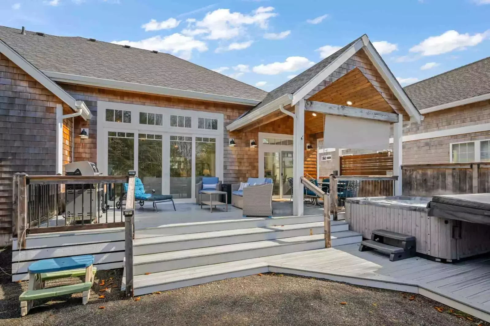 With the grill, hot tub, and comfy seating, the deck is a perfect place to hang out.
