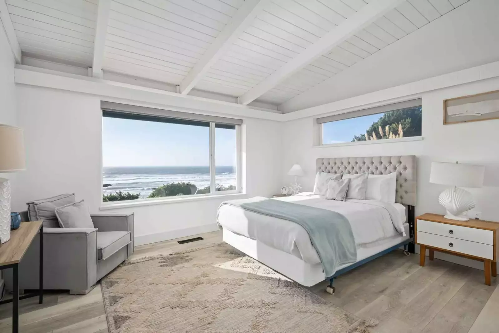 This bedroom has an excellent view of the sea.