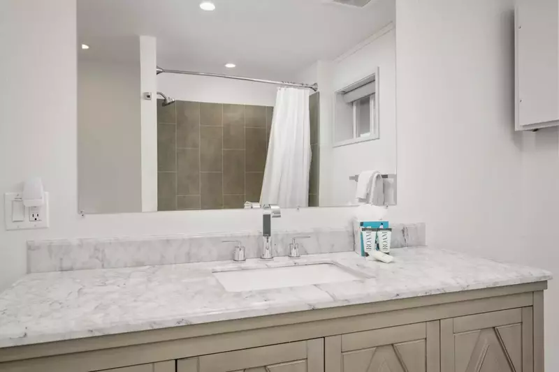 An up to date bathroom with plenty of counter space.