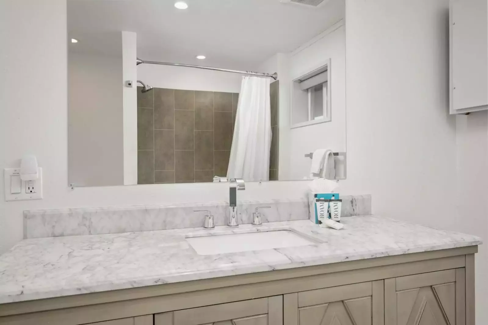 An up to date bathroom with plenty of counter space.