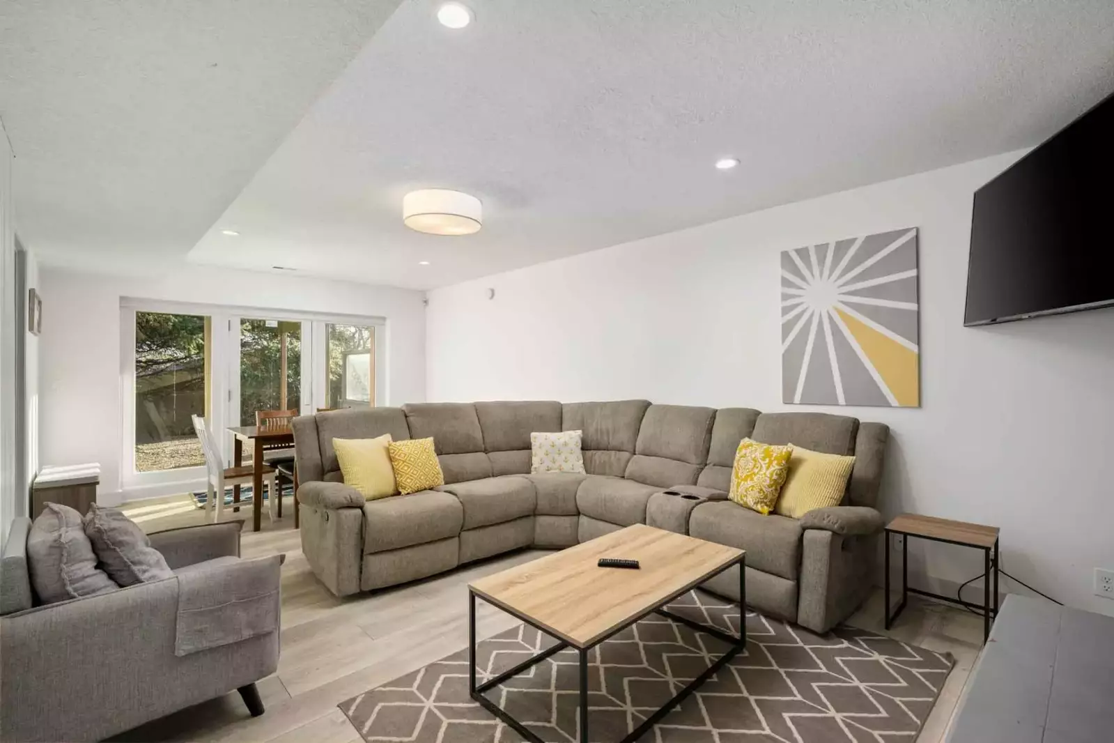 Another relaxing spot with great design and a tv.